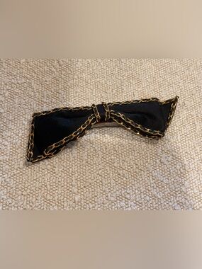 CHANEL Black Satin Bow Hair Clip with Gold Chain Trim